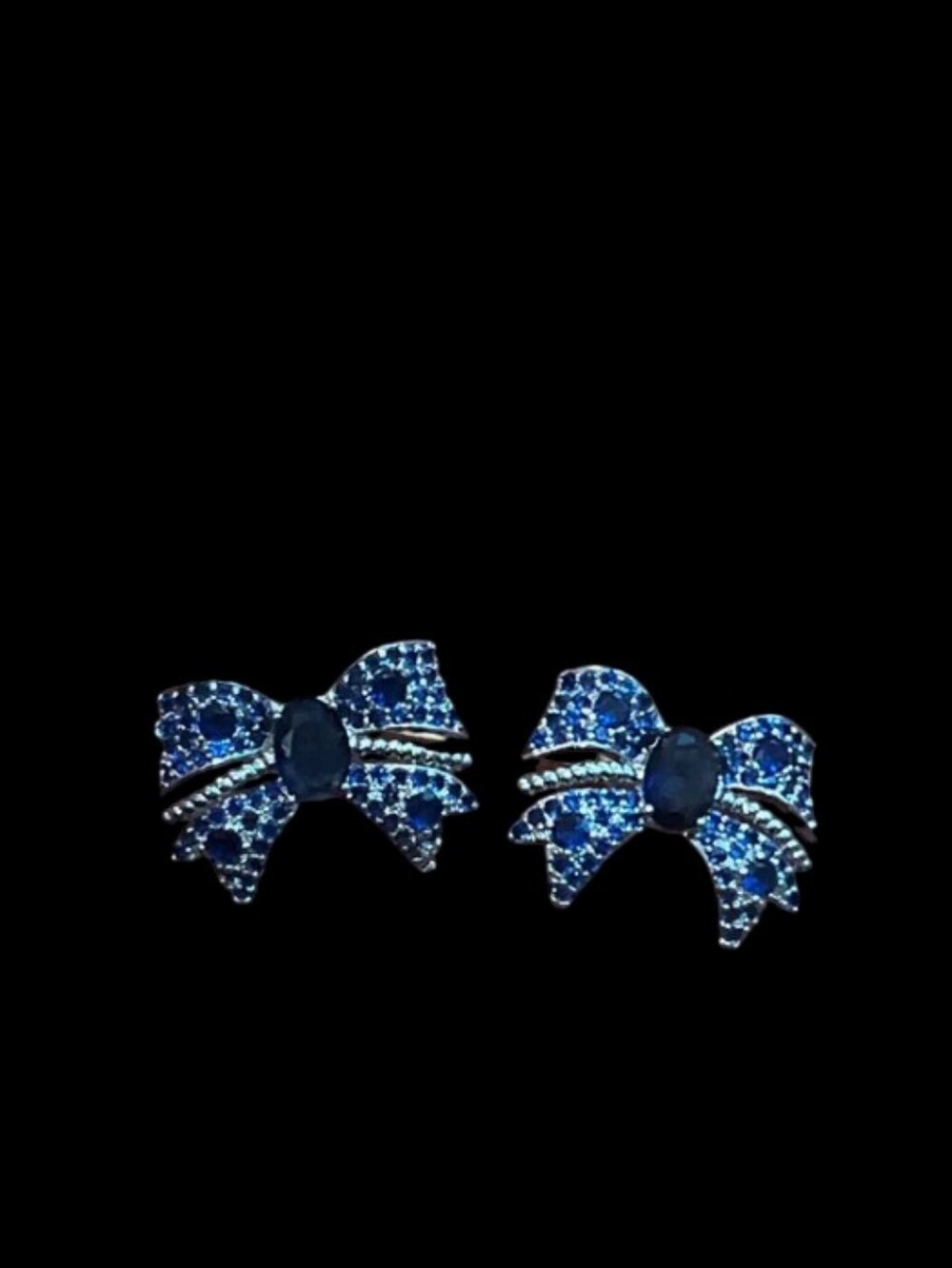 Beautiful Bow Stud Silver Tone Earrings in Blue Crystals
